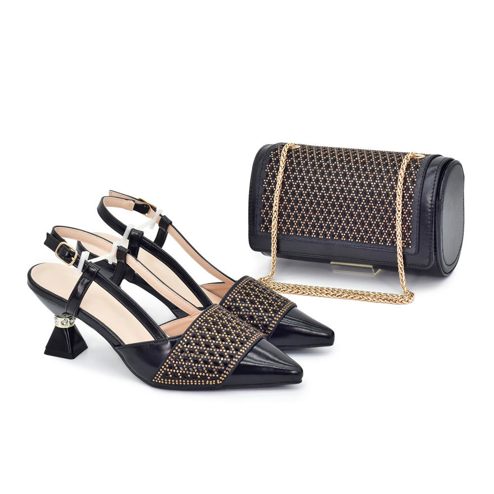 Black rhinestone heels with a matching bag.